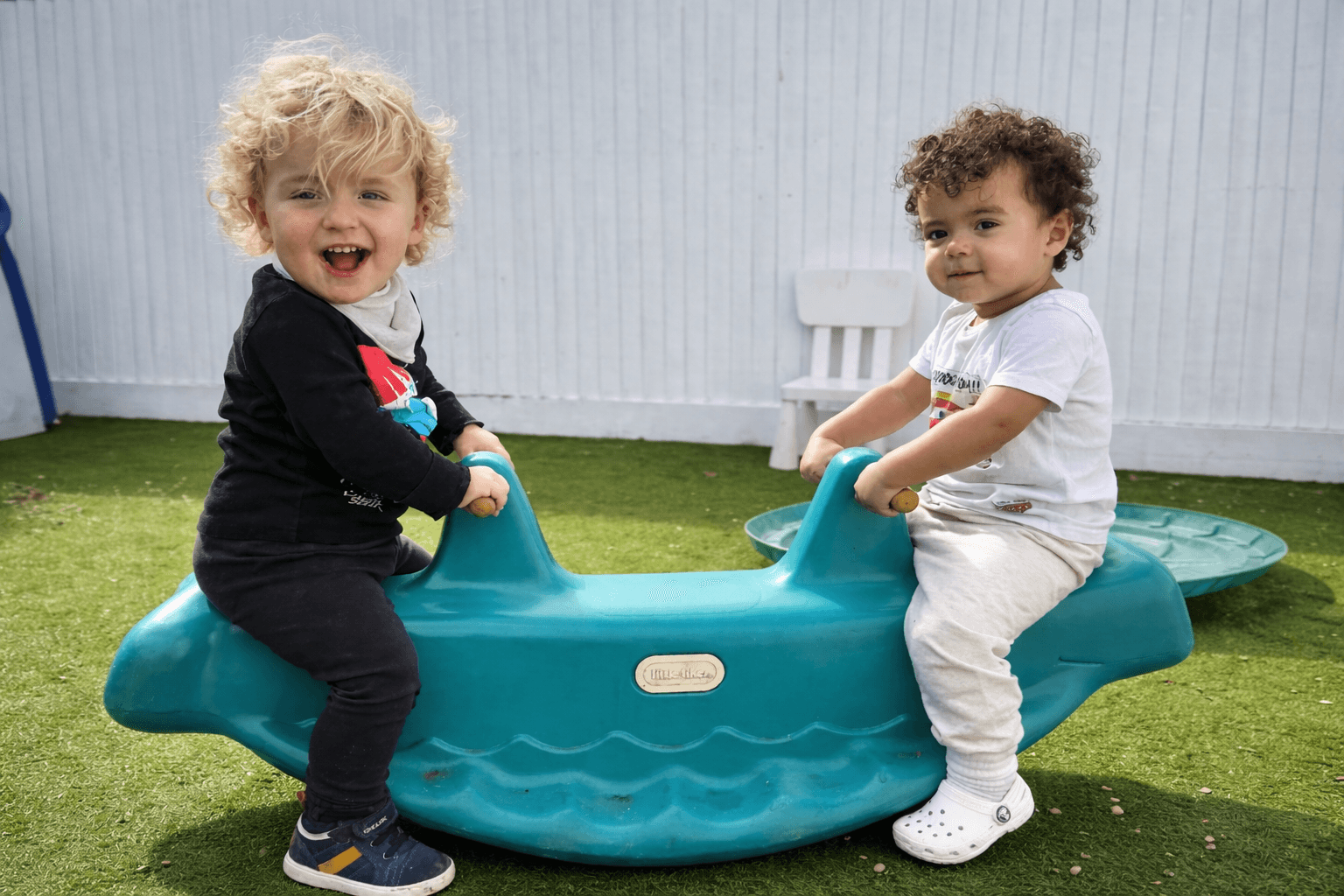 Children taking part in baby yoga and soft play activities